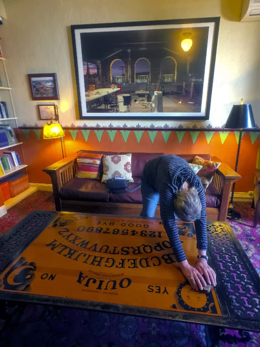 At the haunted Hotel Congress in Tucson, a Ouija board table provides visitors with a...