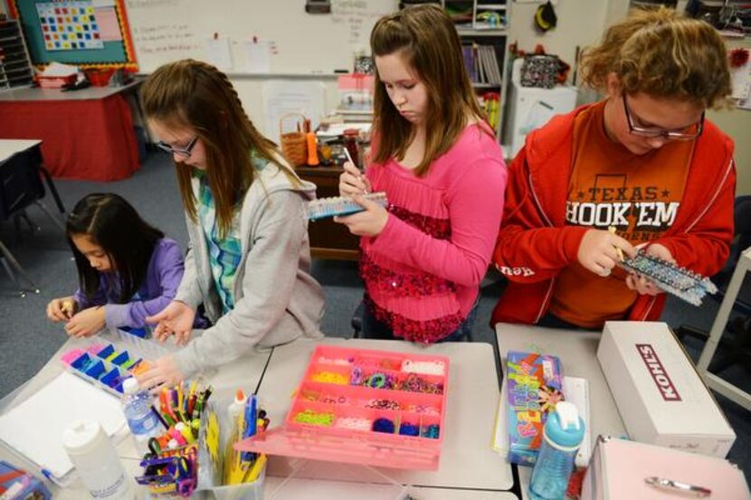 
Fifth-grade students (from left) Tammy Phan, Karley Klodner, Kami Wortham and Hartley...