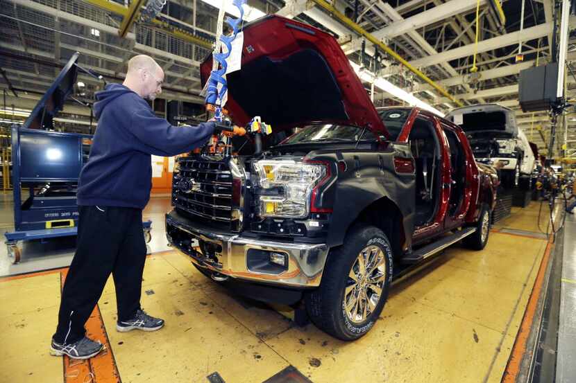  Strong profits at Ford last year, fueled by pickup sales, will earn UAW workers $9,300...