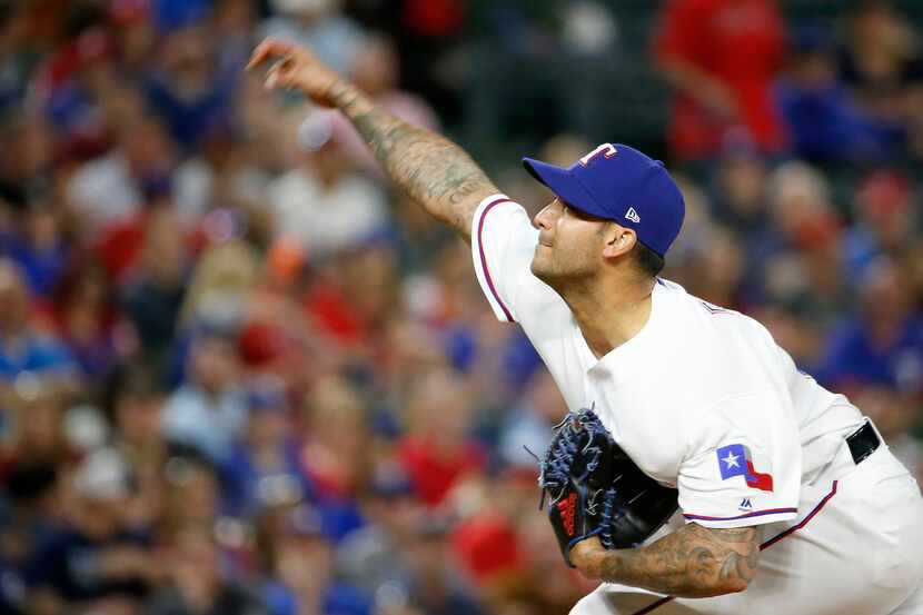 Texas Rangers relief pitcher Matt Bush (51) throws a pitch against Los Angeles Angels during...