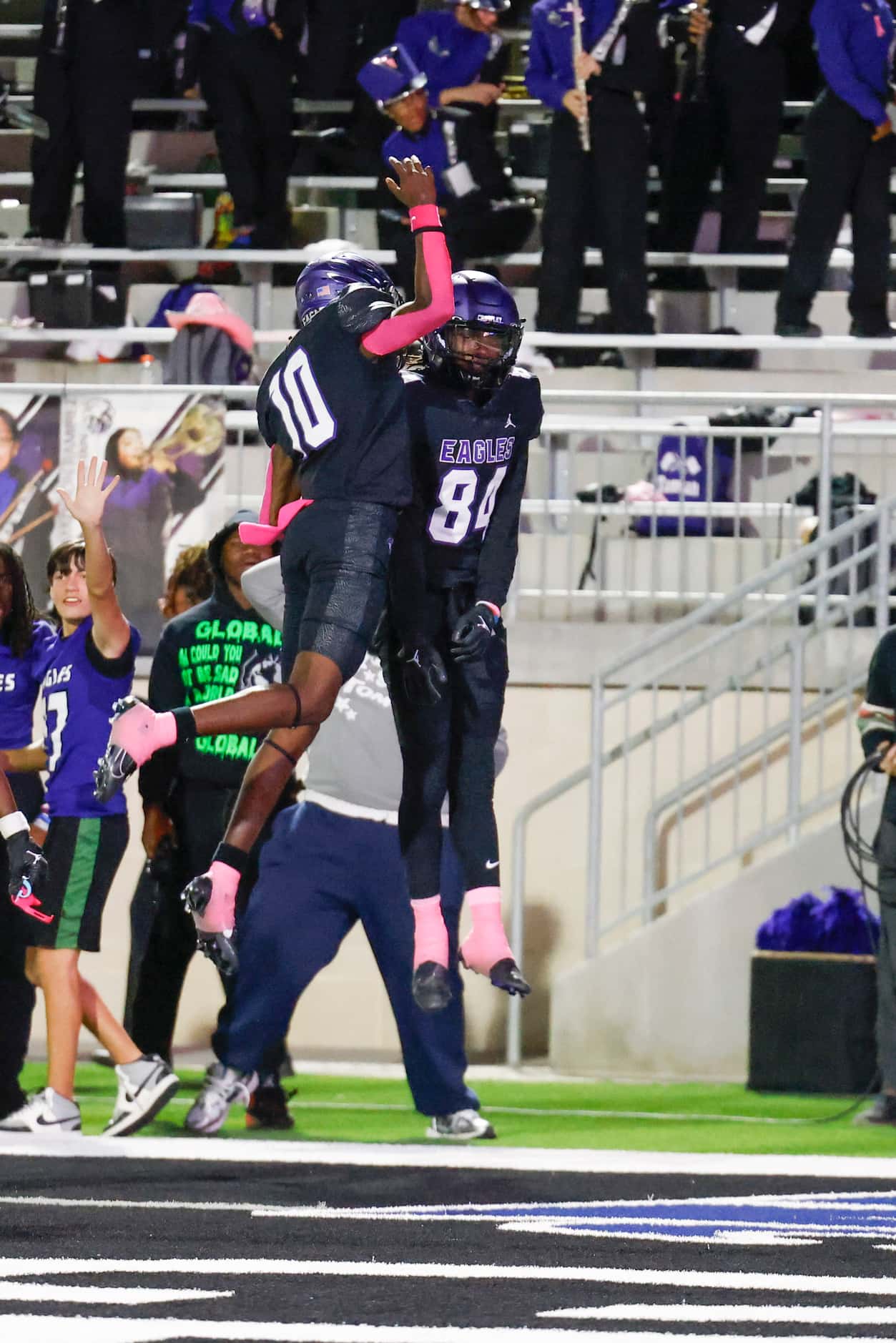 Crowley High’s Caleb Williams (10) and Jacque Overton celebrate a touchdown against Trinity...