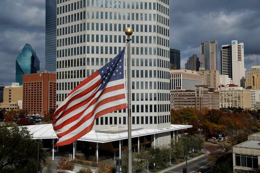 The downtown Dallas skyline, including the newly remodeled 400 Record St. building, is seen...