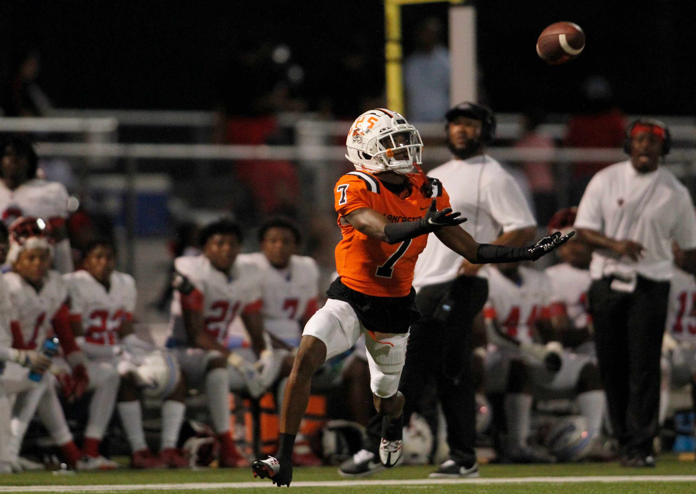 Lancaster defensive back Jaitlin Hampton (7) tracks a pass but is unable to pull in the...