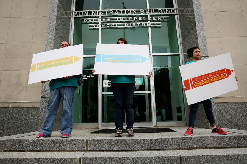 Tanya Hernandez (left) rallies for a tax ratification election with her daughter, Stephanie...