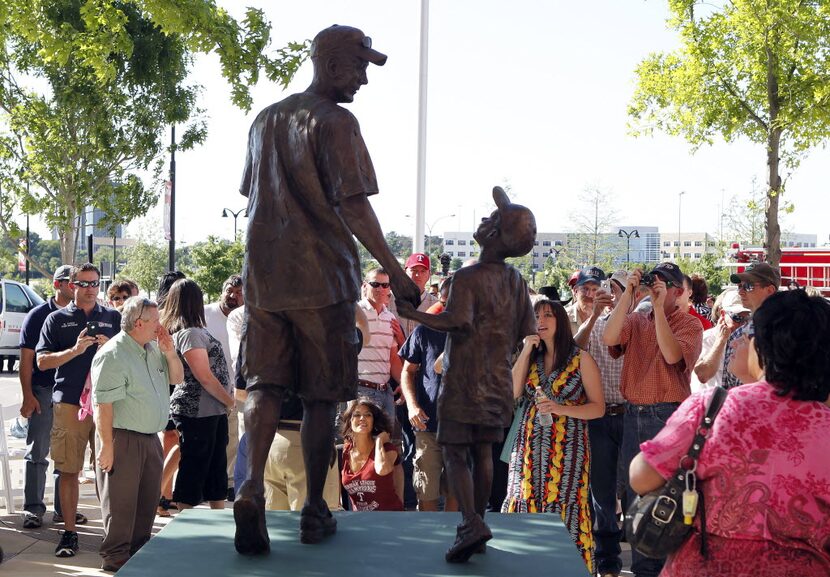 Family and friends at the unveiling of the statue of Shannon Stone and Cooper at Rangers ...