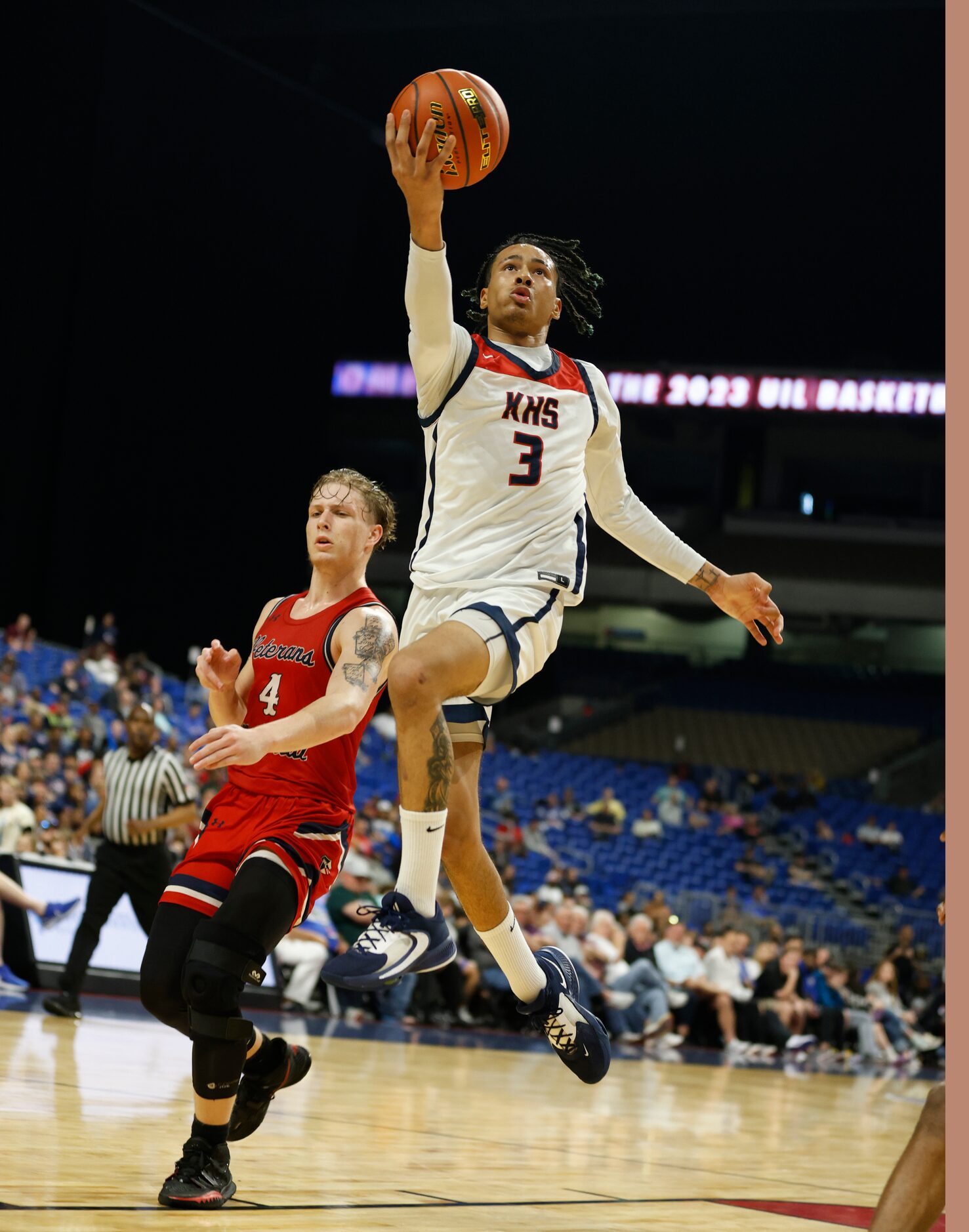 Dallas Kimball Tylar Hankamer (3) scores by San Antonio Veterans Memorial Tyler Eguia (4)...