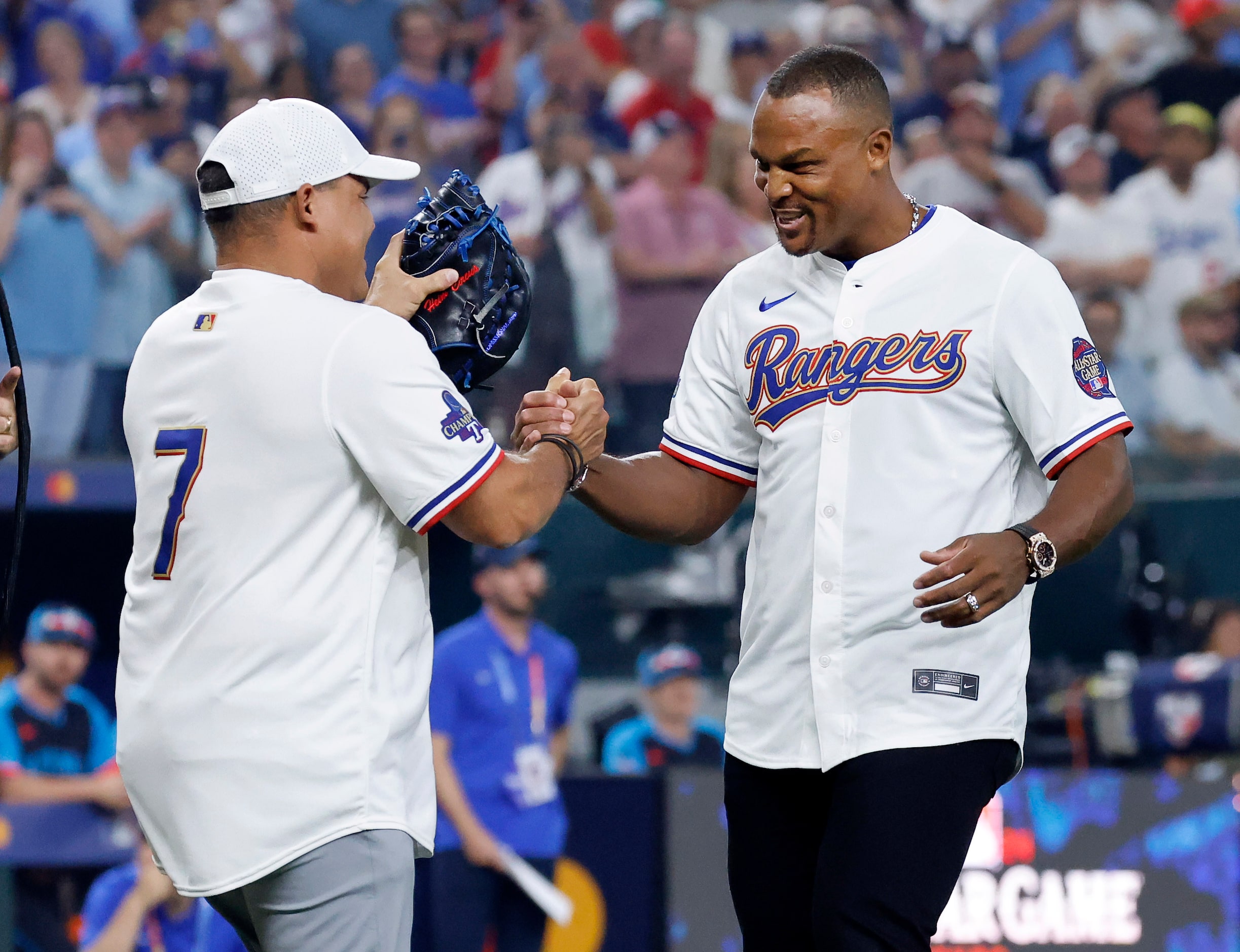 New Baseball Hall of Fame member Adrian Beltre (right) gives fellow Rangers Hall of Fame...