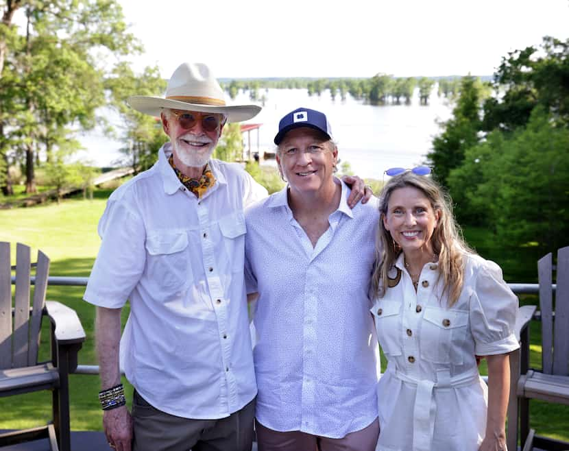 Shannon Wynne, left, sculptor Brad Oldham and his wife and collaborator Christy Coltrin pose...