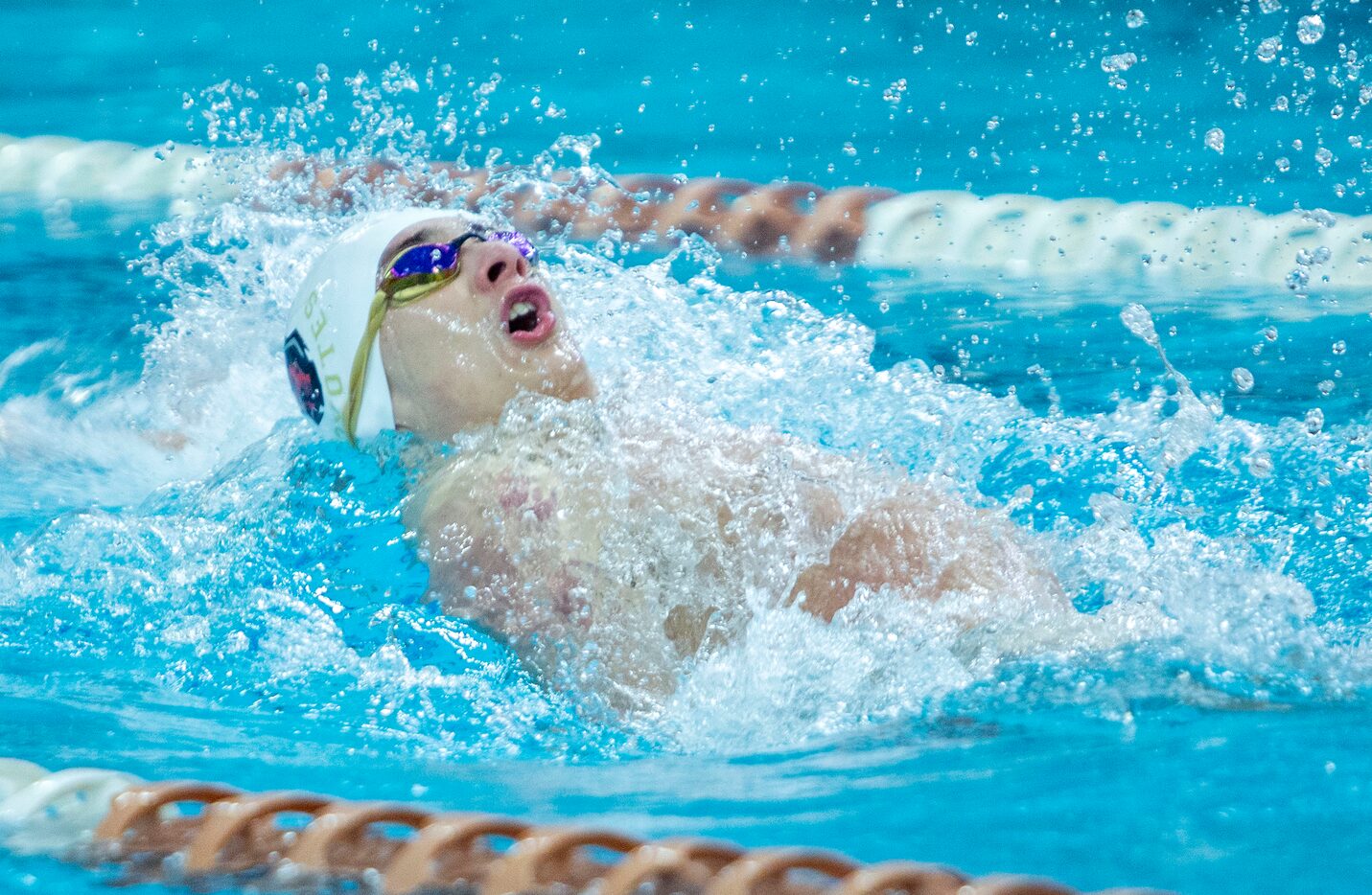 Frisco Heritage's Liam Giles competes in the boys 5A 200-yard medley relay during the 5A...