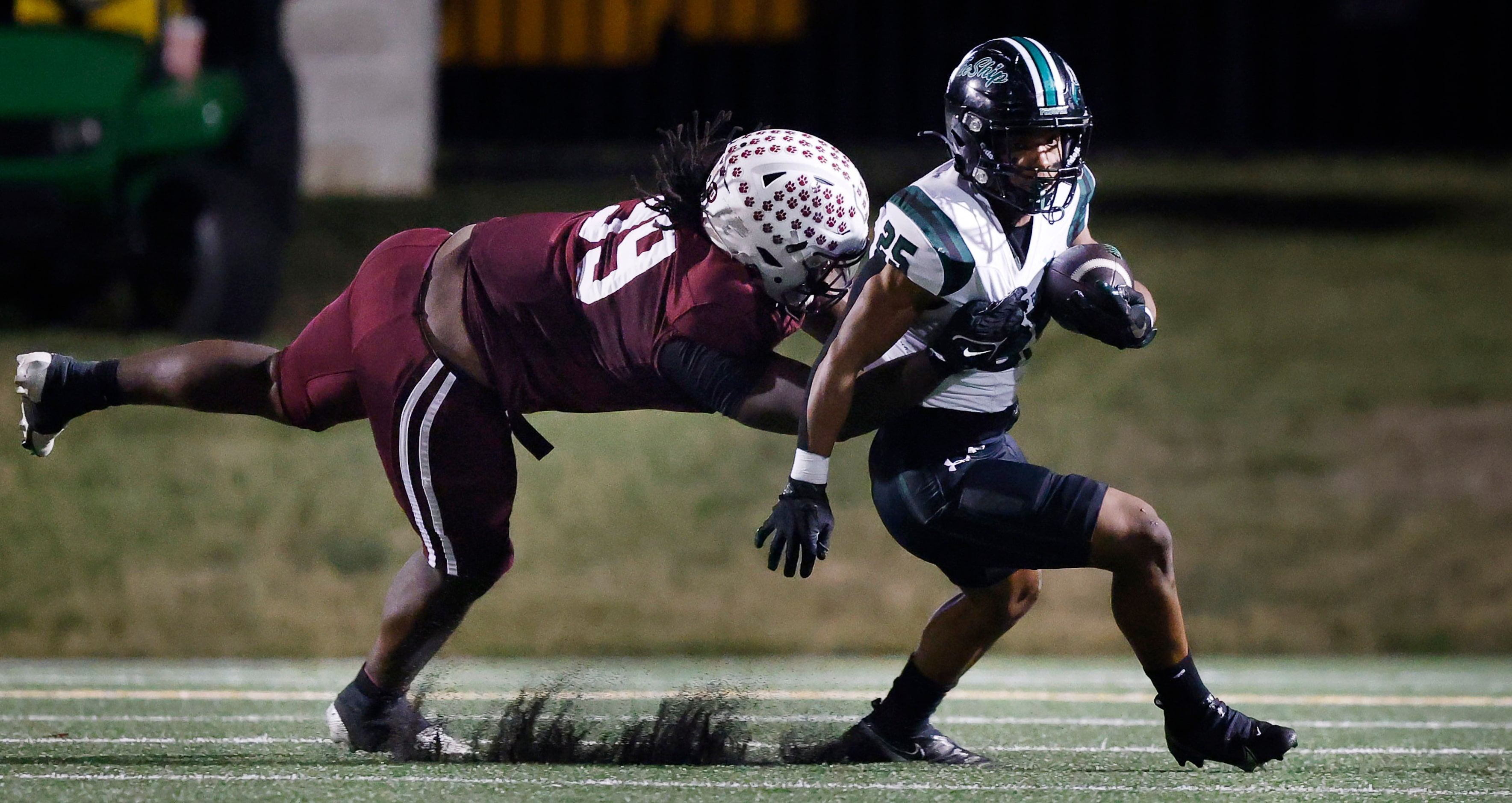 Plano High defensive lineman Rodney Jones (99) makes a diving tackle attempt of Prosper High...