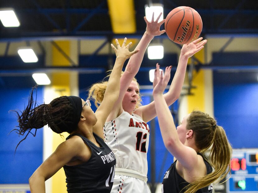 Argyle senior forward Vivian Gray (12) finds an open teammates for an assist against the...