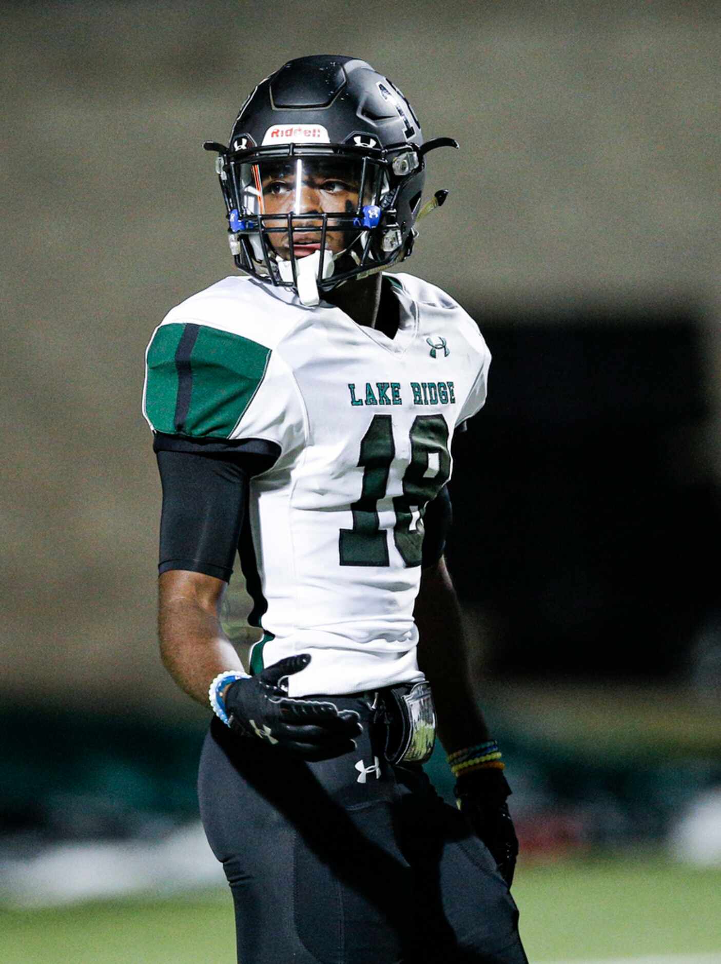 TXHSFB Mansfield Lake Ridge senior wide receiver Keylan Johnson (18) looks on during the...