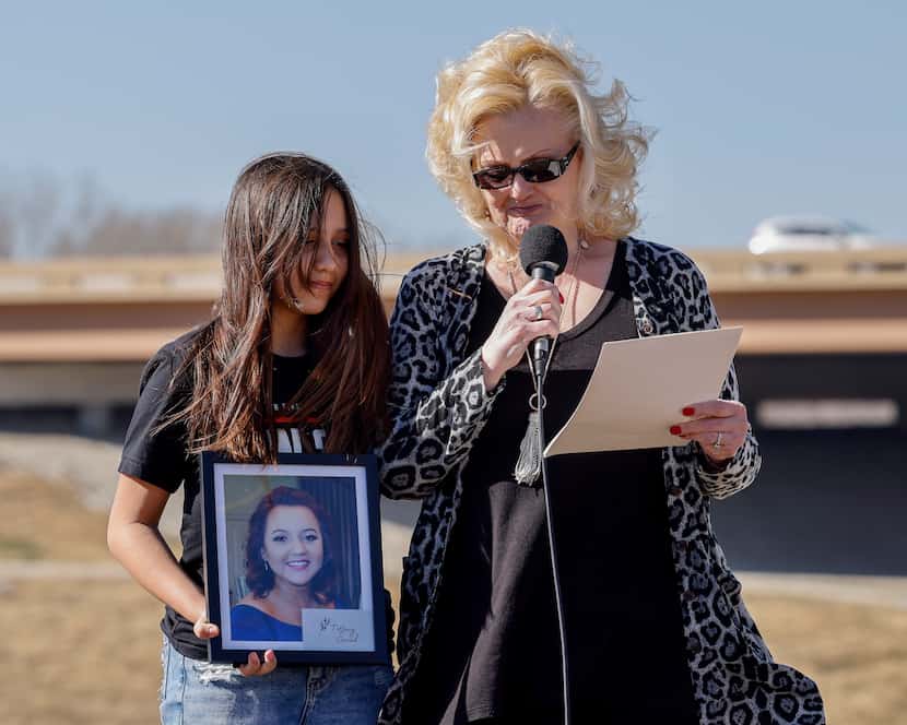 Emri Contreras, 11, daughter of Tiffany Gerred, held a photo of her mother while Gerred's...