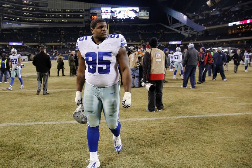 Dallas Cowboys defensive tackle Josh Brent (95) walks off the field following his first game...