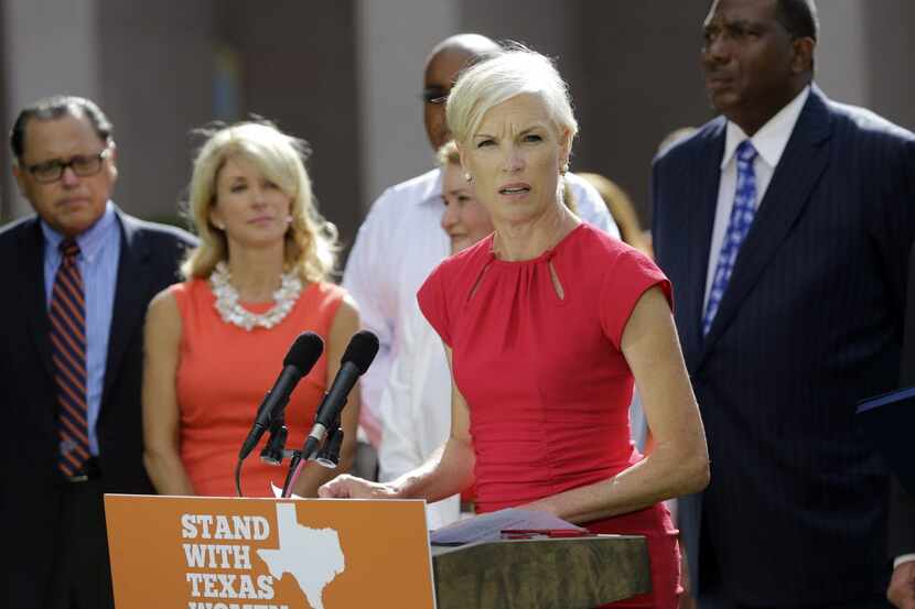 Cecile Richards, president of the Planned Parenthood Federation of America, stands with...