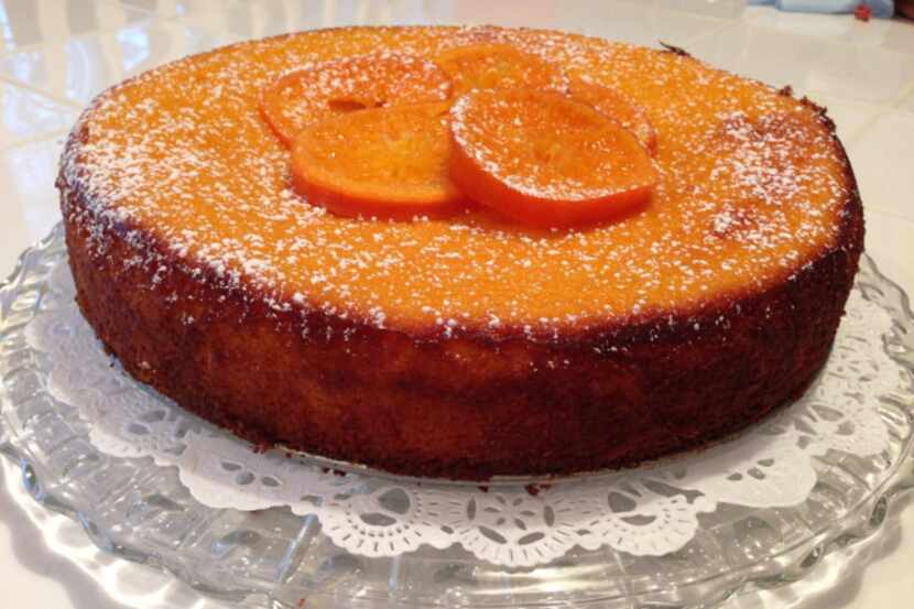 Clementine Cake topped with powered sugar.