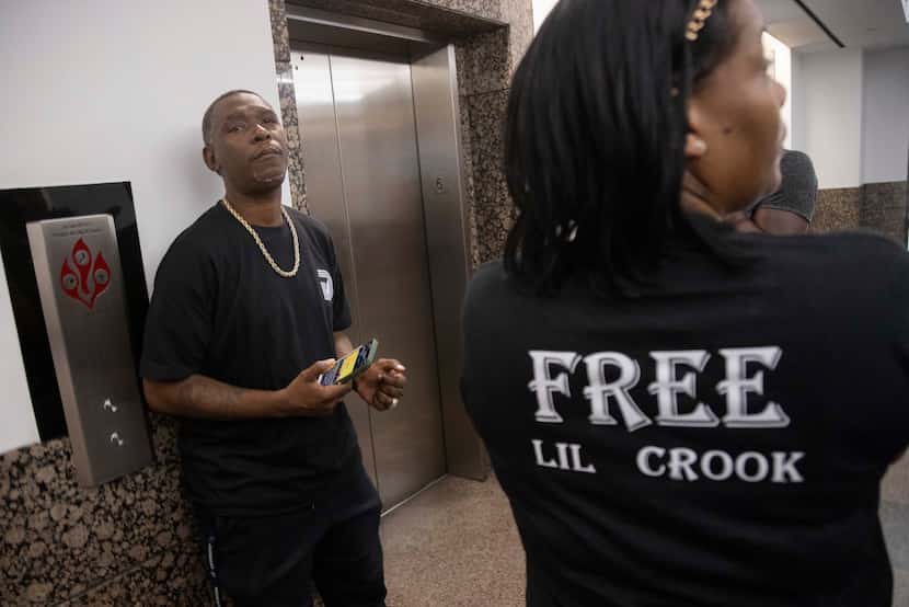 (From left) Bryan Jones, known as Mr. Pookie, and Nakedra Smith-Jones wait for the elevator...