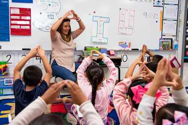 Claudia Sanchez-Salas teaches her kindergarten class the alphabet during a class at...