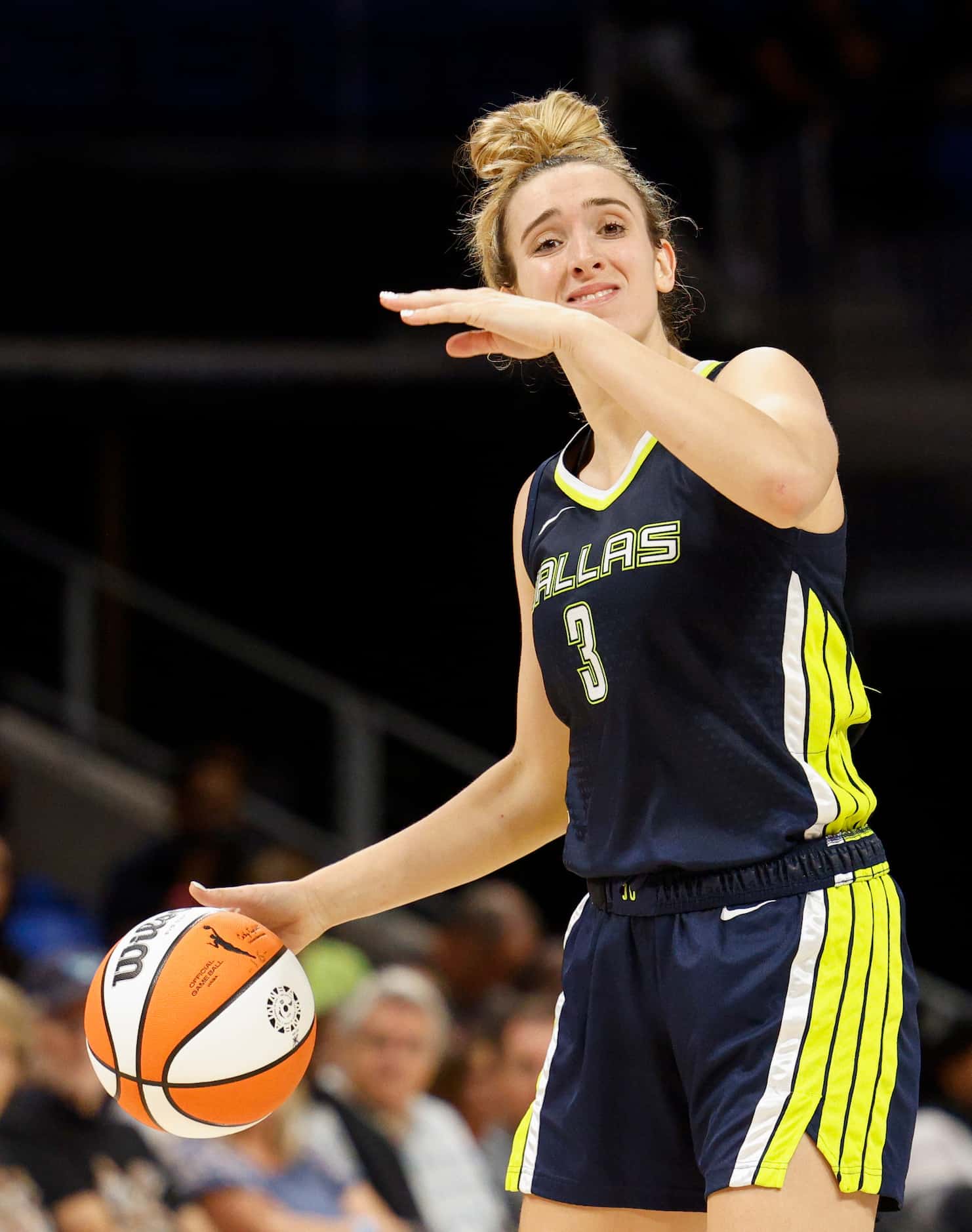 Dallas Wings guard Marina Mabrey (3) directs her teammates around the court during the...