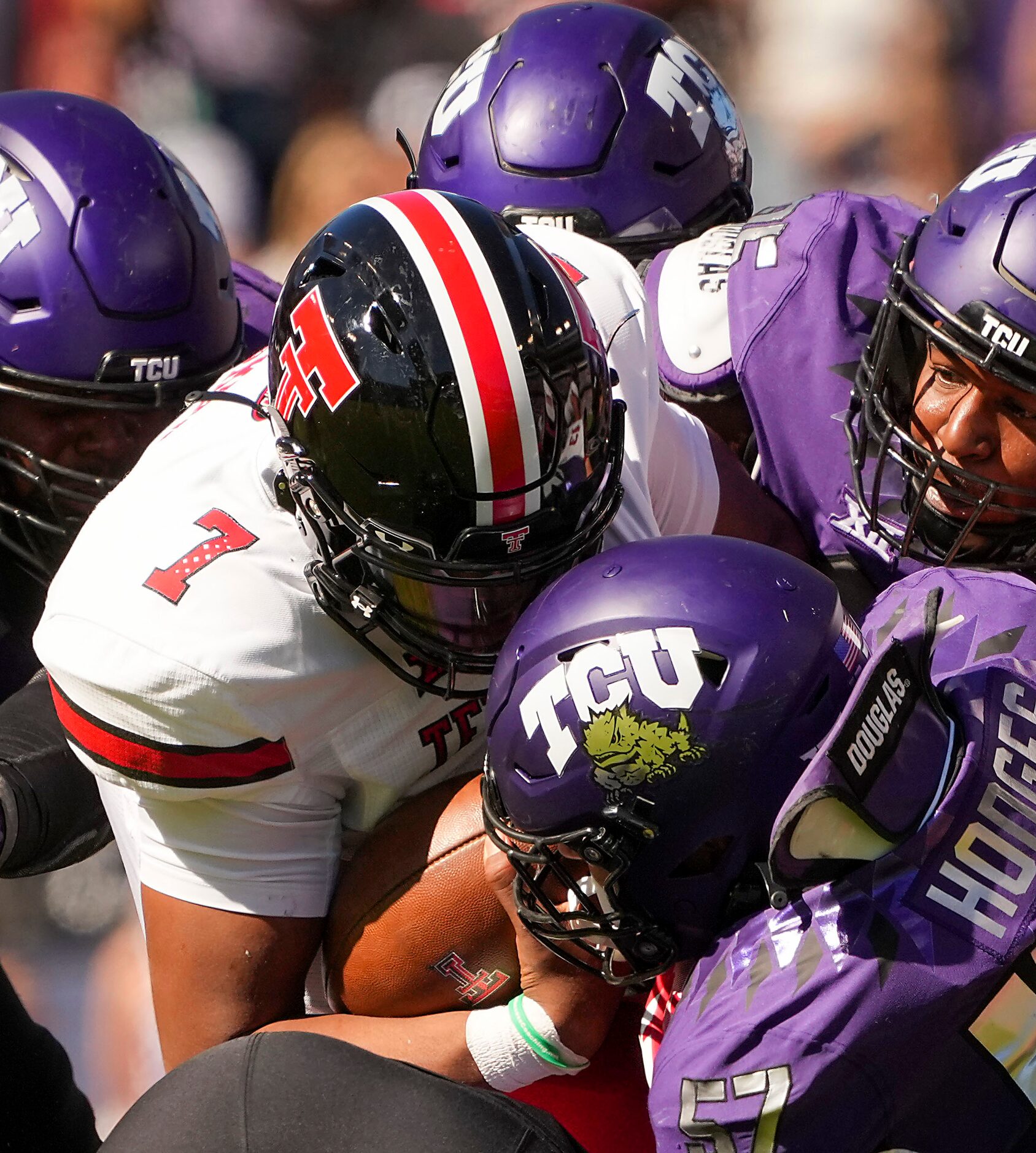 Texas Tech quarterback Donovan Smith (7) is stopped on a fourth down play by TCU linebacker...