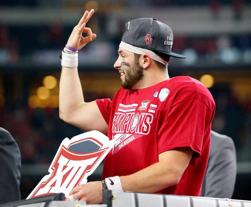 Oklahoma Sooners quarterback Baker Mayfield (6) celebrates his Big XII Championship win over...