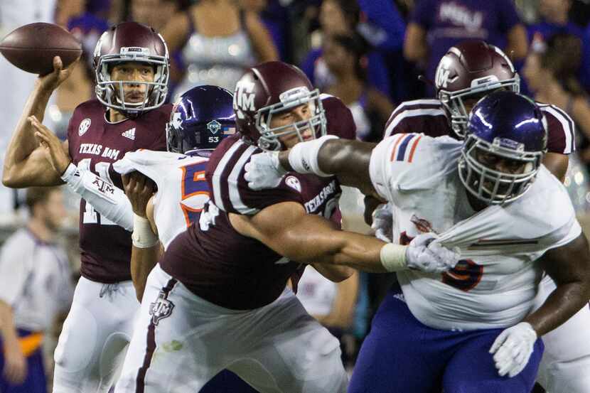 Texas A&M Aggies quarterback Kellen Mond (11) looks to make a pass during a matchup between...