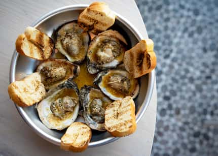 The chargrilled oysters from Krio restaurant in Oak Cliff are delightful.