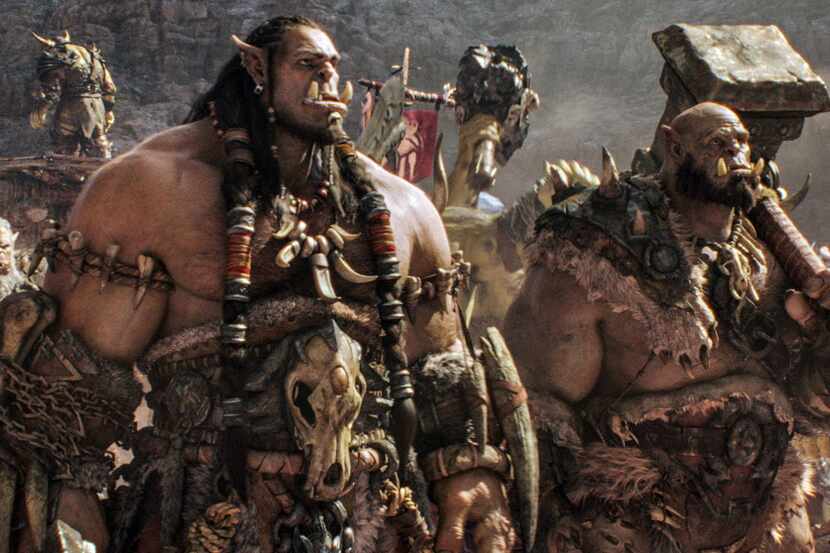 This image released by Universal Pictures shows characters Orc chieftain Durotan, voiced by...