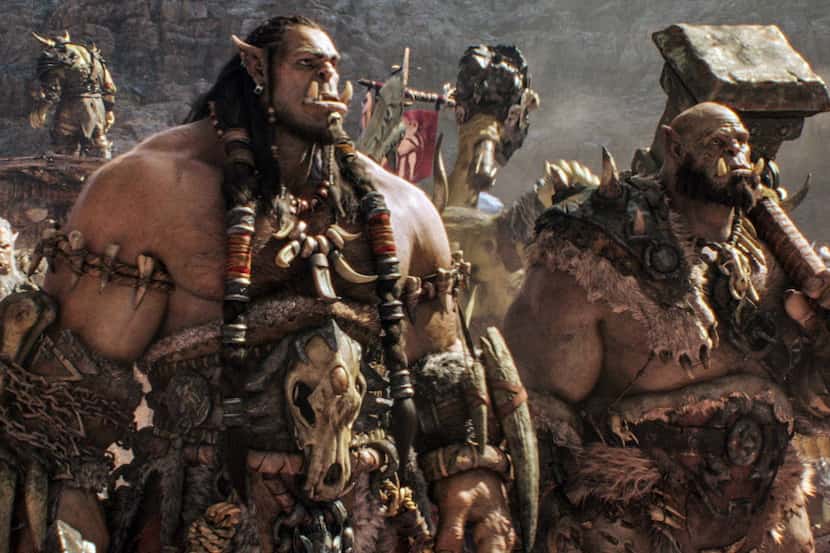 This image released by Universal Pictures shows characters Orc chieftain Durotan, voiced by...