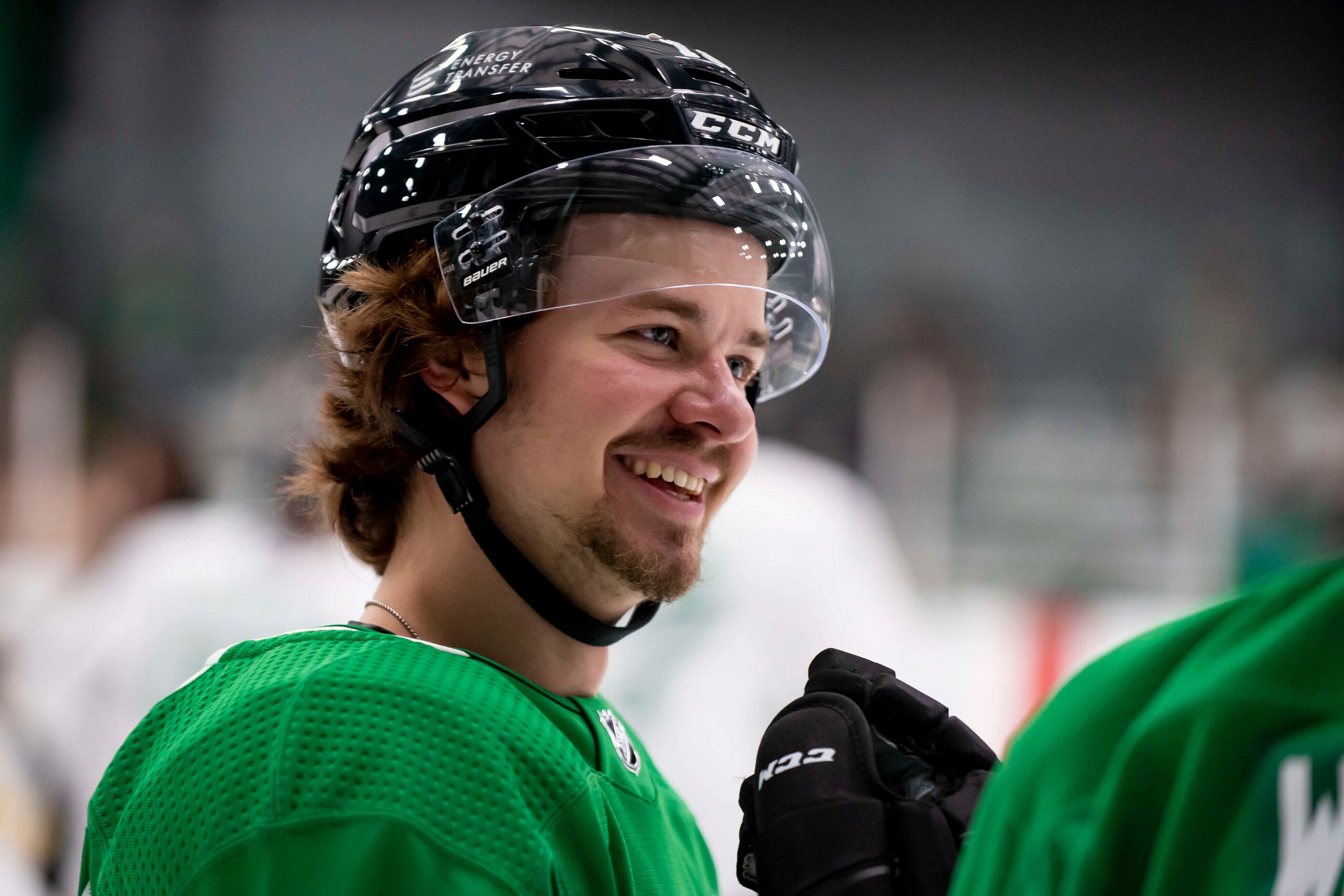 Forward Logan Morrison (73) smiles while conversing with a teammate during the 2022 Dallas...