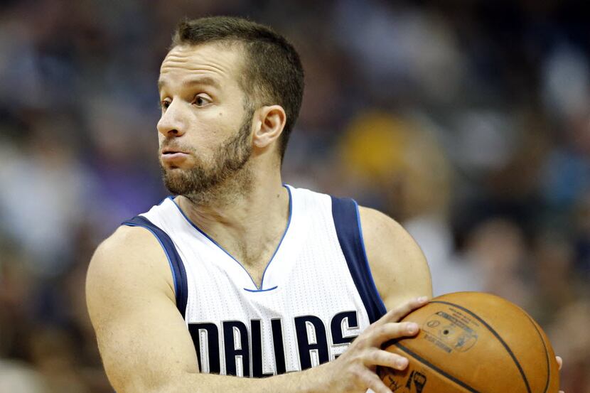Dallas Mavericks guard J.J. Barea looks to pass during the first half against the Indiana...