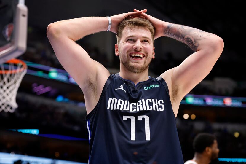 Dallas Mavericks guard Luka Doncic (77) reacts after being fouled and missing a shot against...
