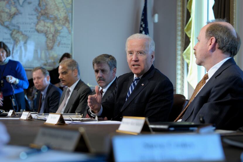 President Joe Biden, second from right, gestures as he speaks during a meeting with...