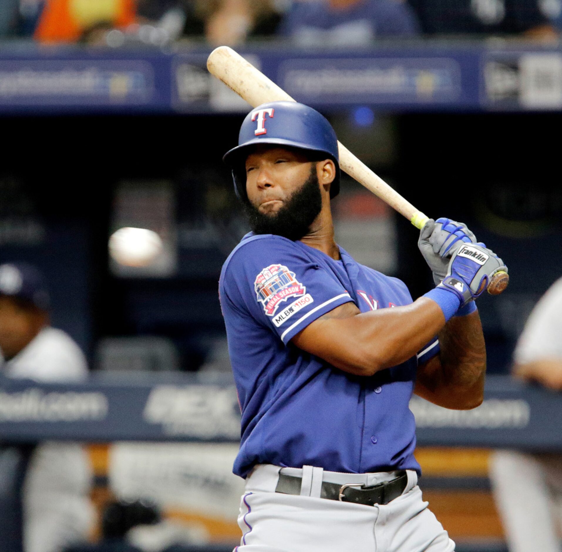 ST. PETERSBURG, FL - JUNE 29: Danny Santana #38 of the Texas Rangers winces as a pitch comes...