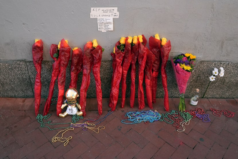 A memorial of flowers is set up on Canal and Bourbon Street, Thursday, Jan. 2, 2025 in New...