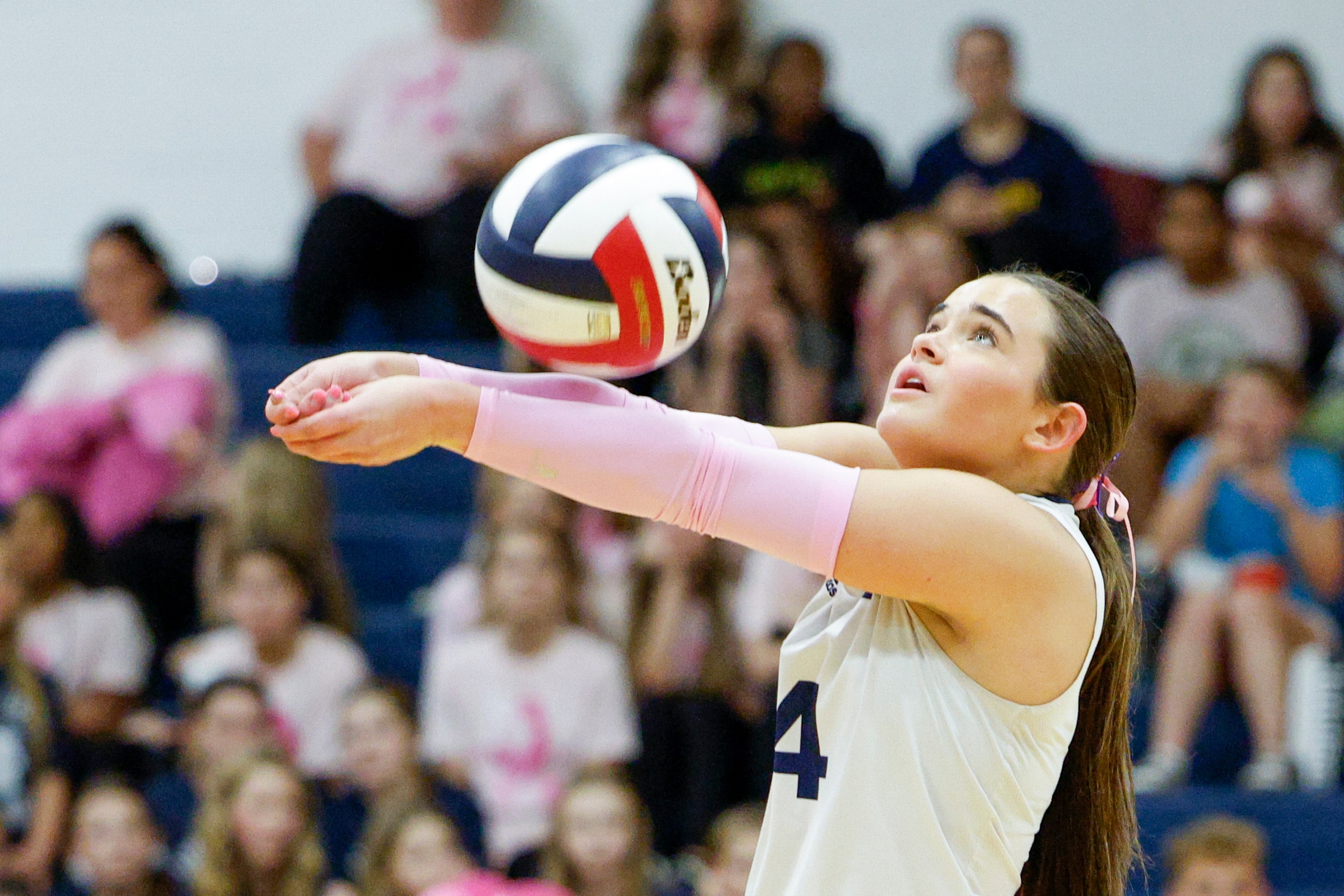 Keller's Lauren Scheiden (4) passes the ball to a teammate during a high school volleyball...