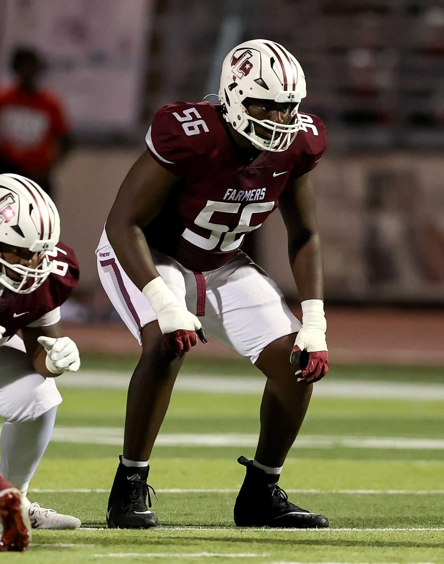 Lewisville offensive lineman Michael Fasusi is set and ready to face Denton Braswell during...