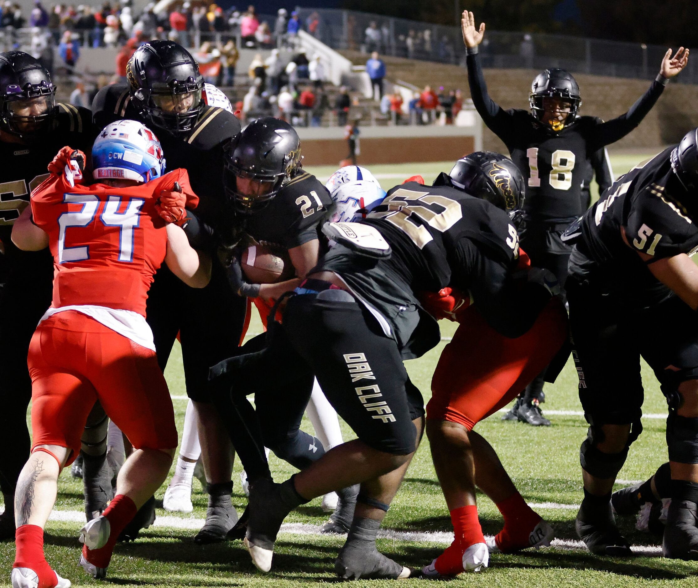 South Oak Cliff running back Danny Green (21) crosses the goal line for the winning...