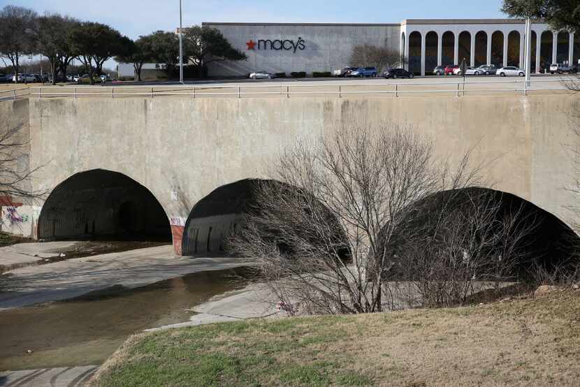 A view south of Macy's near where Spring Creek exits underneath Collin Creek Mall in Plano.