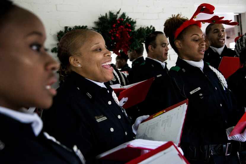 From left, Dallas police officers Sasha Kim, Tamika Dameron and Anna Kubeer, all of the...