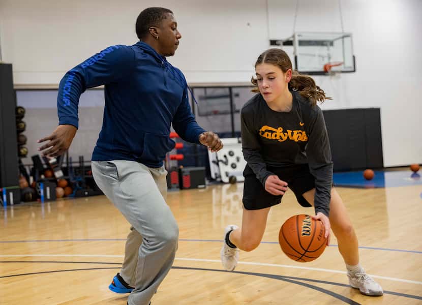 Eighth grader Finley Chastain (right) from Celina trains with coach Barrington Stevens at...
