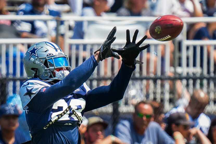 Dallas Cowboys free safety Malik Hooker catches a ball during a training camp practice on...