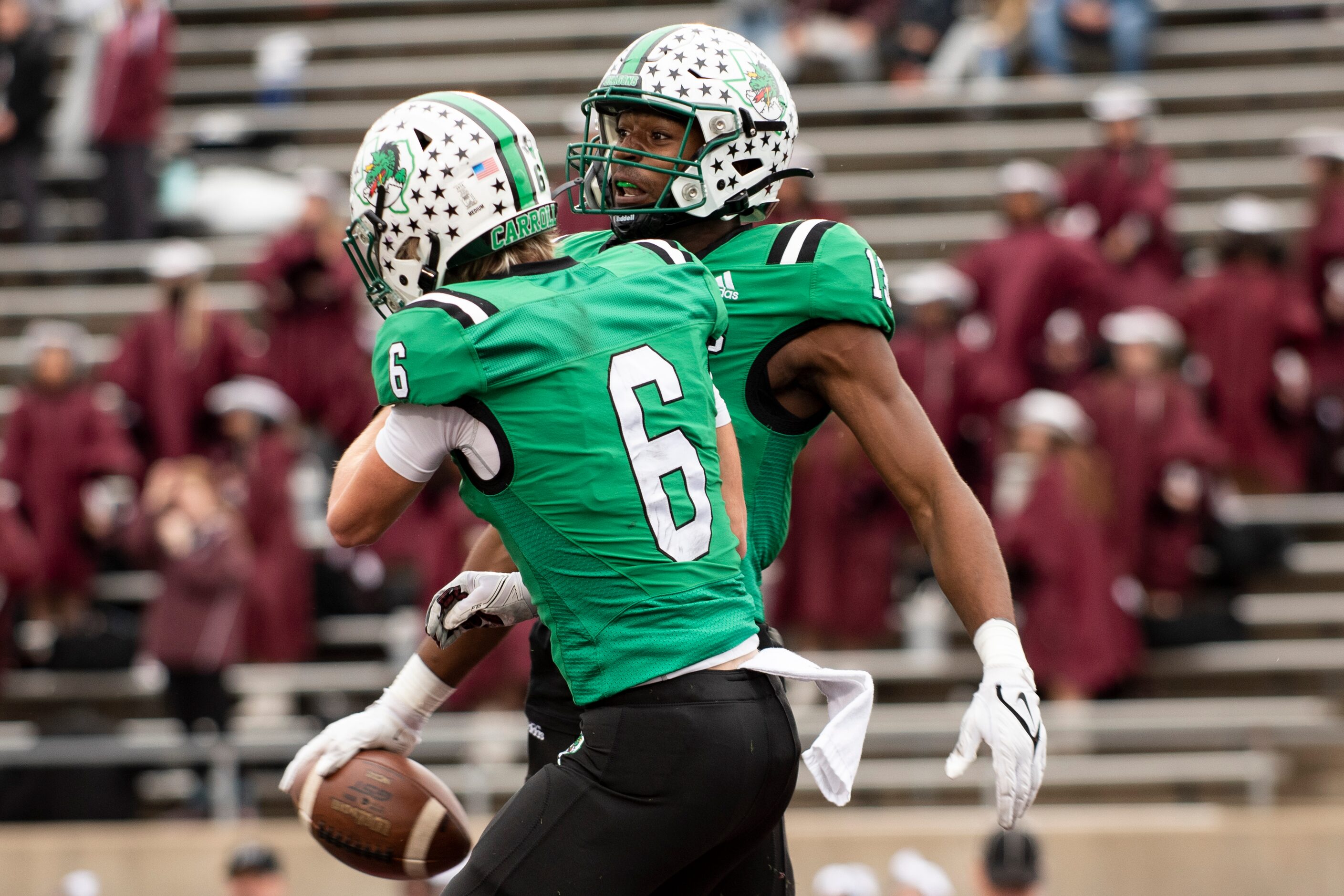 Southlake Carroll senior RJ Maryland (13) celebrates with Southlake Carroll senior Landon...