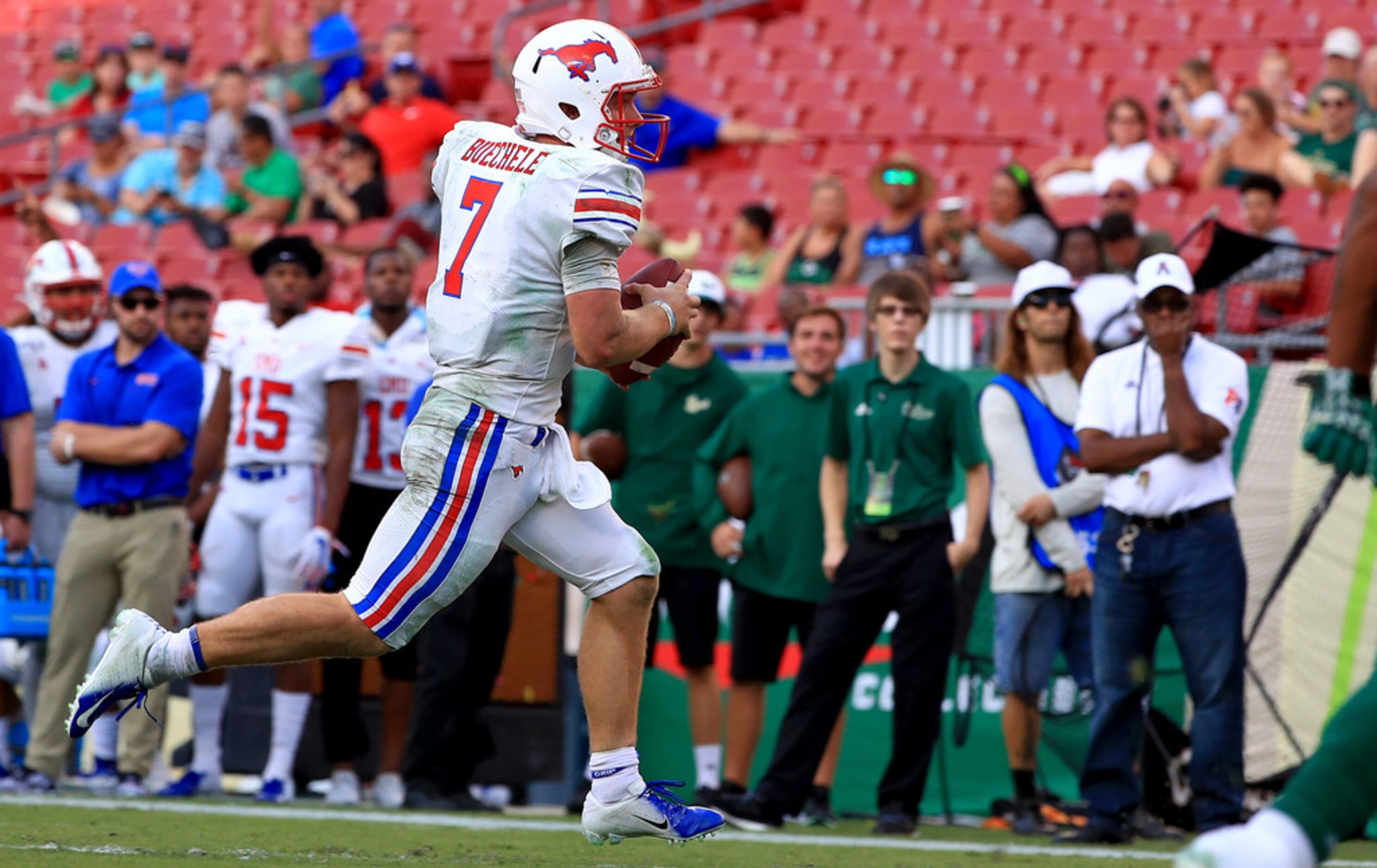 TAMPA, FLORIDA - SEPTEMBER 28: Shane Buechele #7 of the Southern Methodist Mustangs rushes...