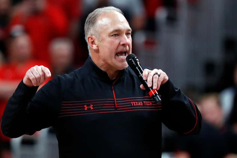 Texas Tech football coach Joey McGuire talks to the crowd during the halftime of an NCAA...