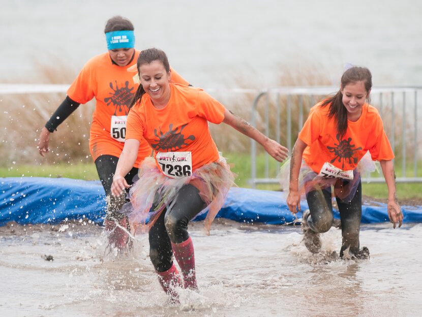 Women competing in the Dirty Girl Mud Run at Cedar Hill State Park on Saturday, Oct. 6, 2012.  