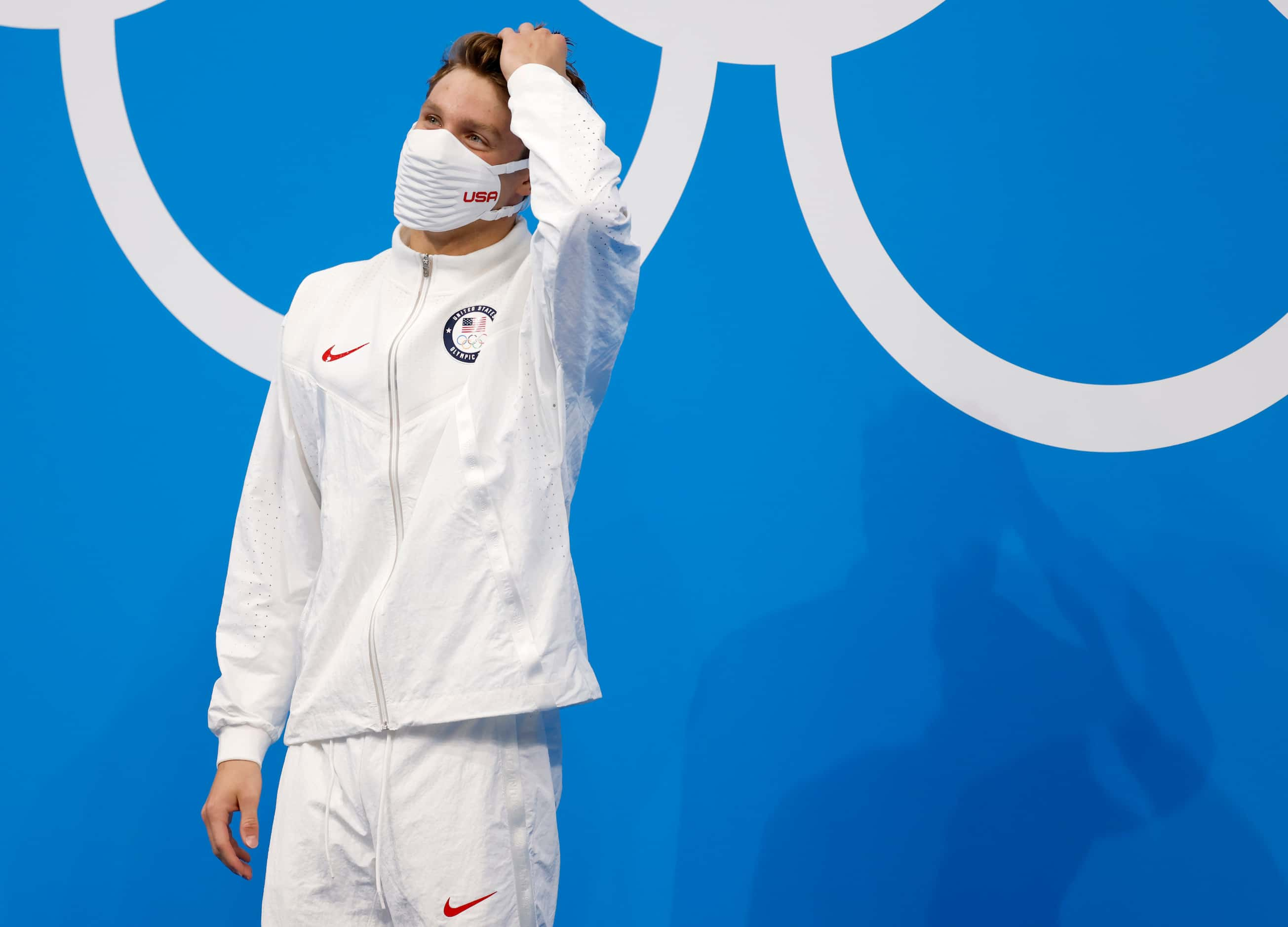 USA’s Robert Finke celebrates before getting his gold medal in the men’s 1500 meter...