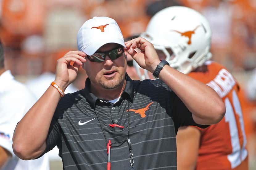 University of Texas Longhorns head coach Tom Herman is pictured during warmups before the...
