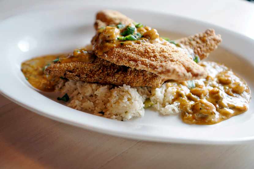 Fried catfish étouffée is one of the dishes at St. Argyle's Cajun Kitchen & Pirogue Sales in...