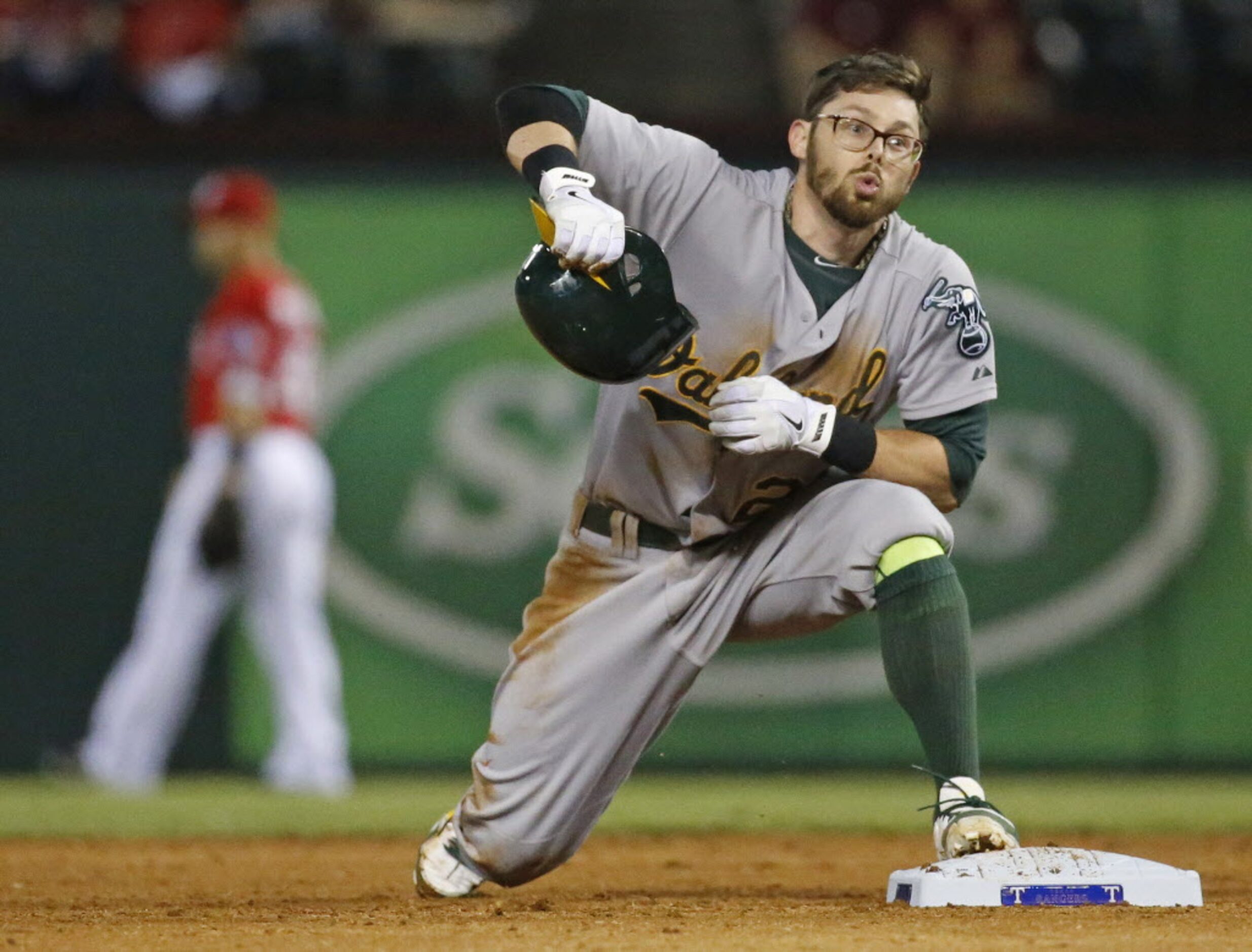 Oakland's Eric Sogard reacts after being called out on an attempted steal of second in the...